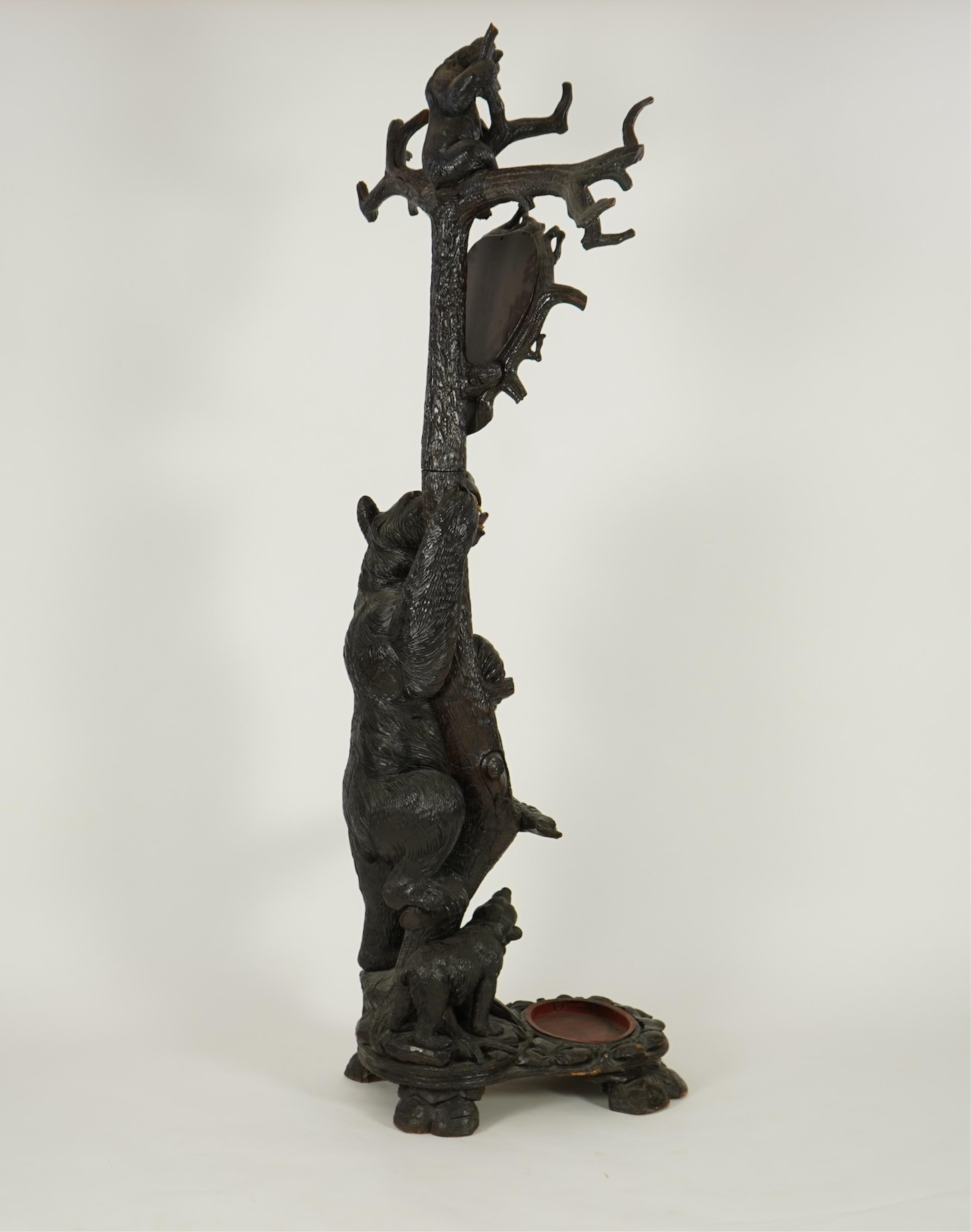 A late 19th century Black forest carved bear hallstand